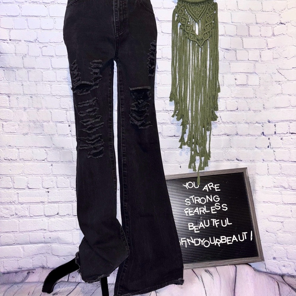 Black Distressed Knee Flare Jeans - Trendy & Chic!